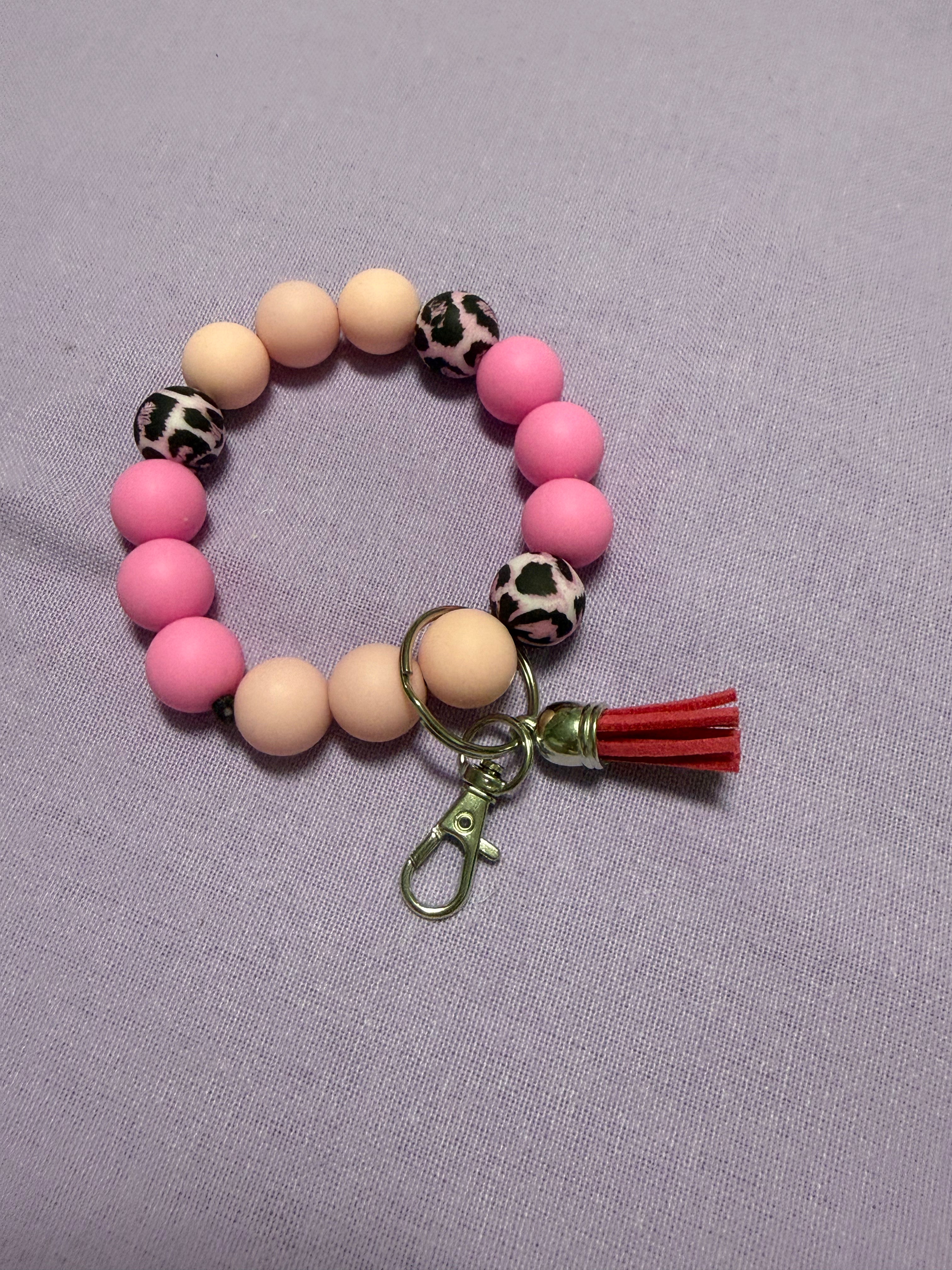 Pink Leo Bubbel Anhänger mit Fransen